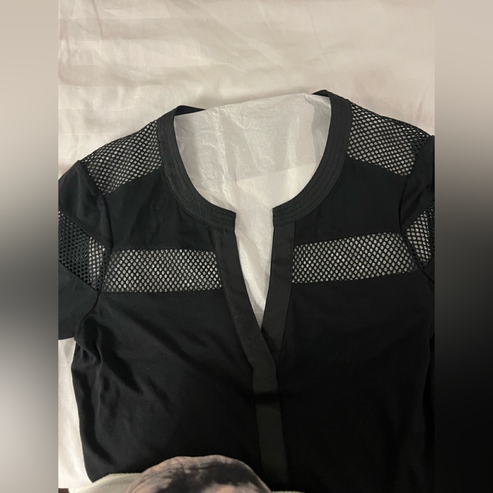Black long sleeve soft top by Karen Millen. Netting at top